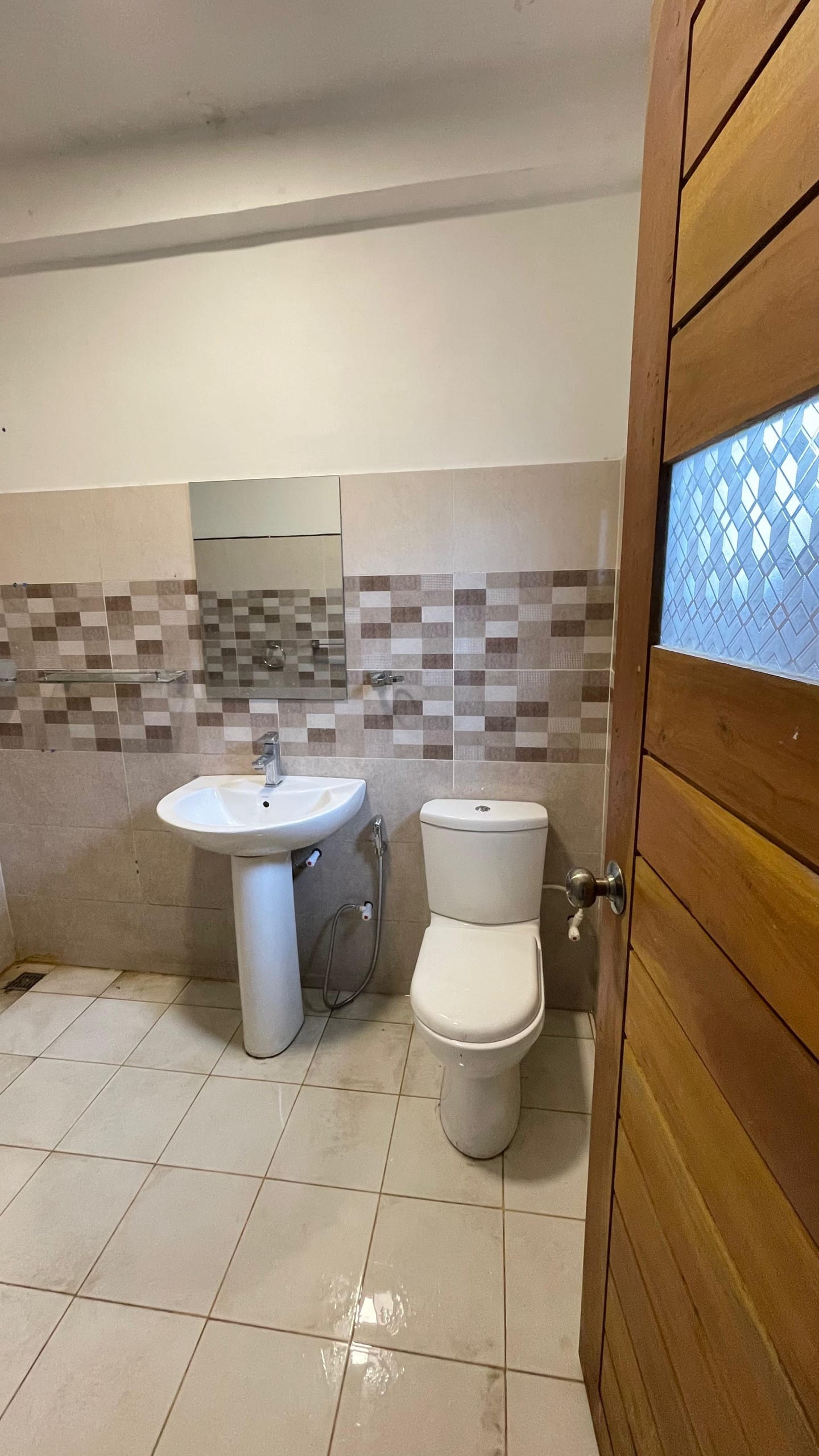 Shared bathrooms at Zonova Mist Guest House, Nuwara Eliya